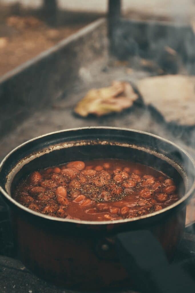 Baked beans recipe in black cooking pot