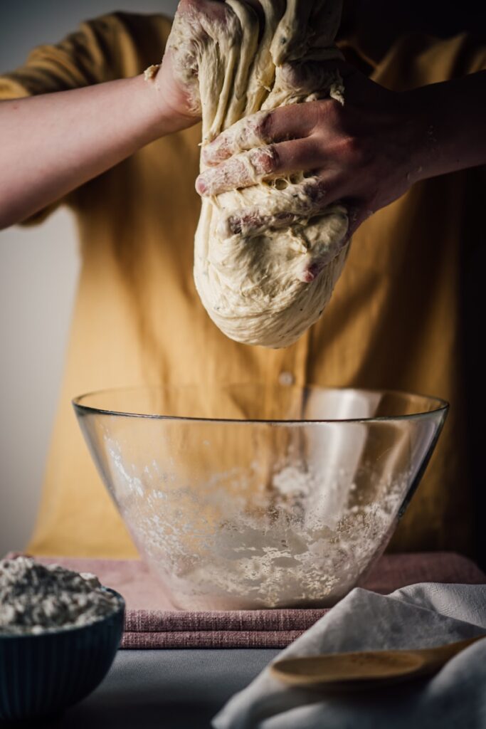 person making a sourdough discard recipes