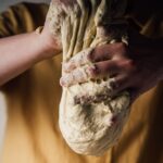 person making a sourdough discard recipes