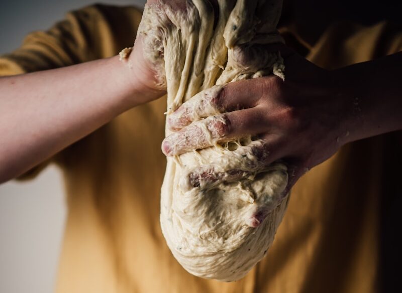 person making a sourdough discard recipes